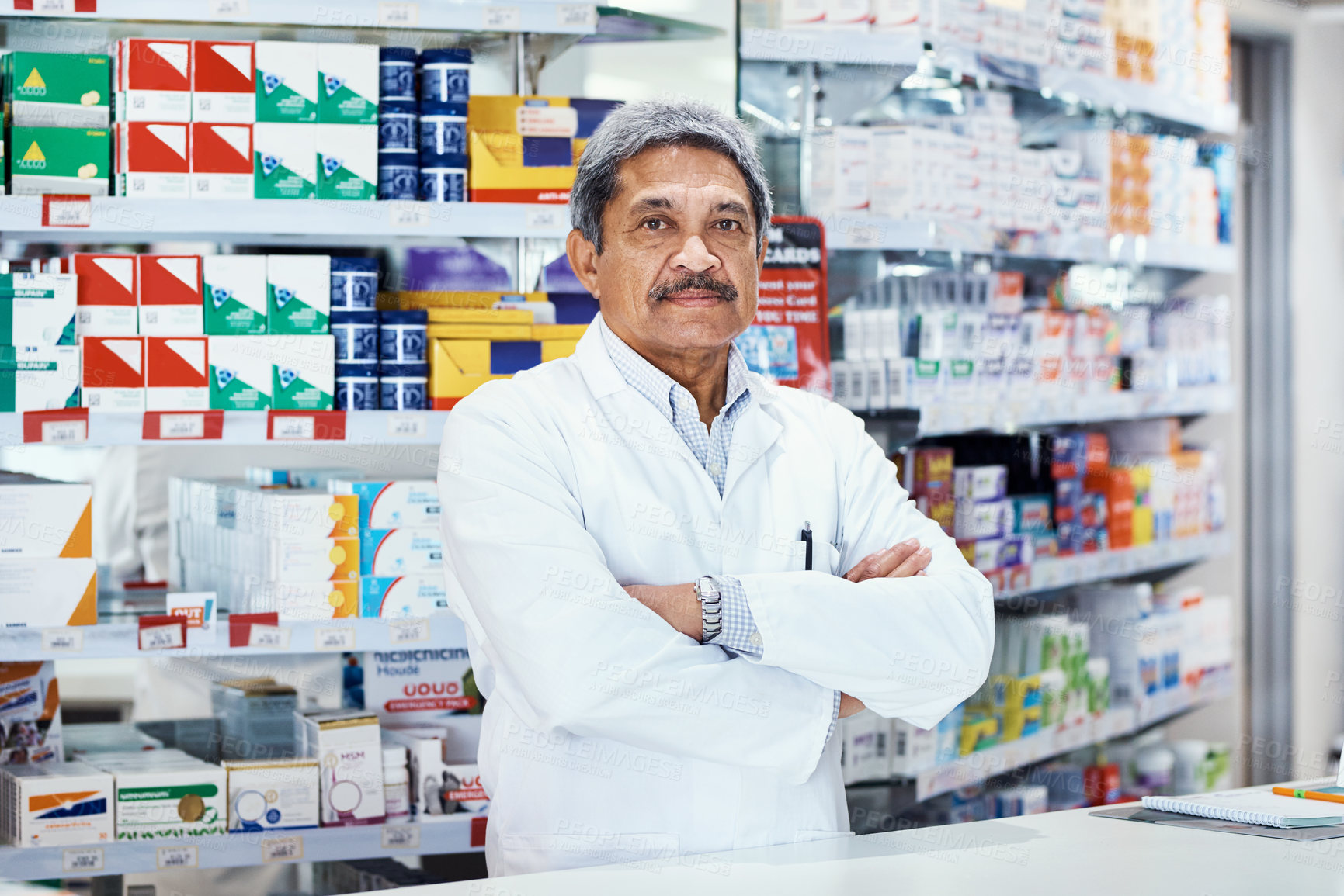 Buy stock photo Arms crossed, mature man and pharmacist at drug store in counter for customer service, support and help. Medical, healthcare and portrait with confidence on treatment or pills advice at pharmacy