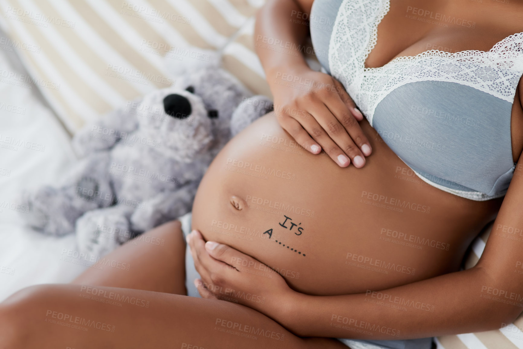 Buy stock photo Pregnant, gender and stomach of woman in bed excited for motherhood, maternity and reveal. Pregnancy guess, bedroom and person for love, prenatal care and health in underwear for resting and relax