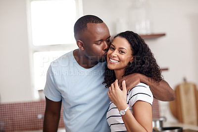 Buy stock photo Cropped shot of a young married couple at home