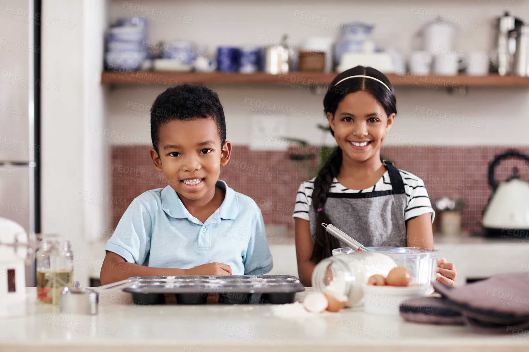 Buy stock photo Home, kitchen and siblings in portrait for baking, recipe and ingredients for dessert preparation. Happy children, boy and girl with pride for cooking, make pastry and learning for skills development