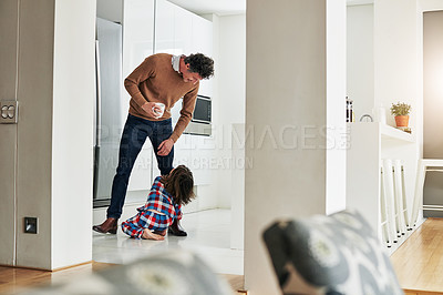 Buy stock photo Dad, boy and kitchen for tantrum in home, argument and naughty for sad child. Morning, leaving and father person for work with upset son on leg, floor and disappointed children in family house