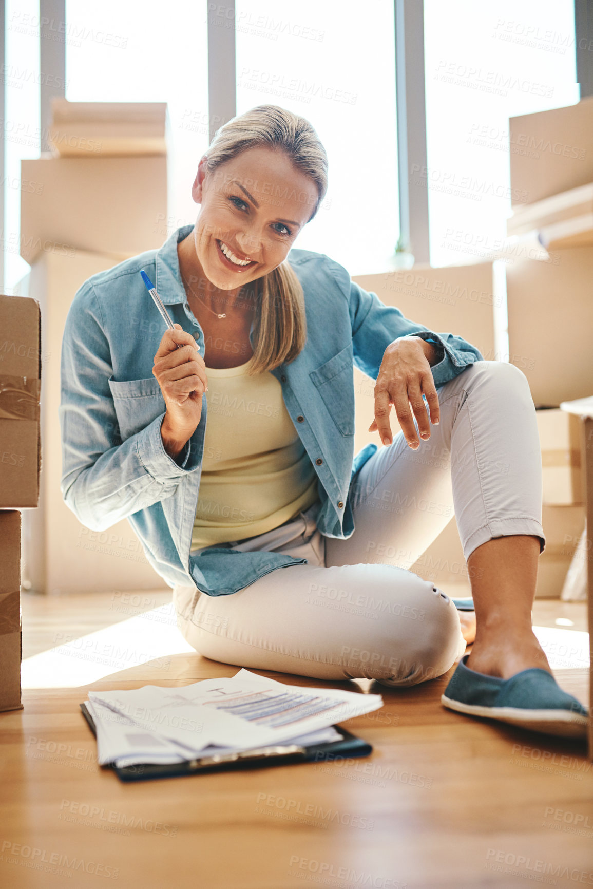 Buy stock photo Portrait, woman and paperwork on the floor in apartment for investing and savings in a contract. Boxes, invest and document in living room of a new house with lease for investment and finance.