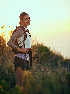 Buy stock photo Woman, portrait and happy for hiking, fitness and exercise on mountain with backpack, plants and active. Girl, health and smile for workout, adventure and healthy outdoor hobby with bag in nature