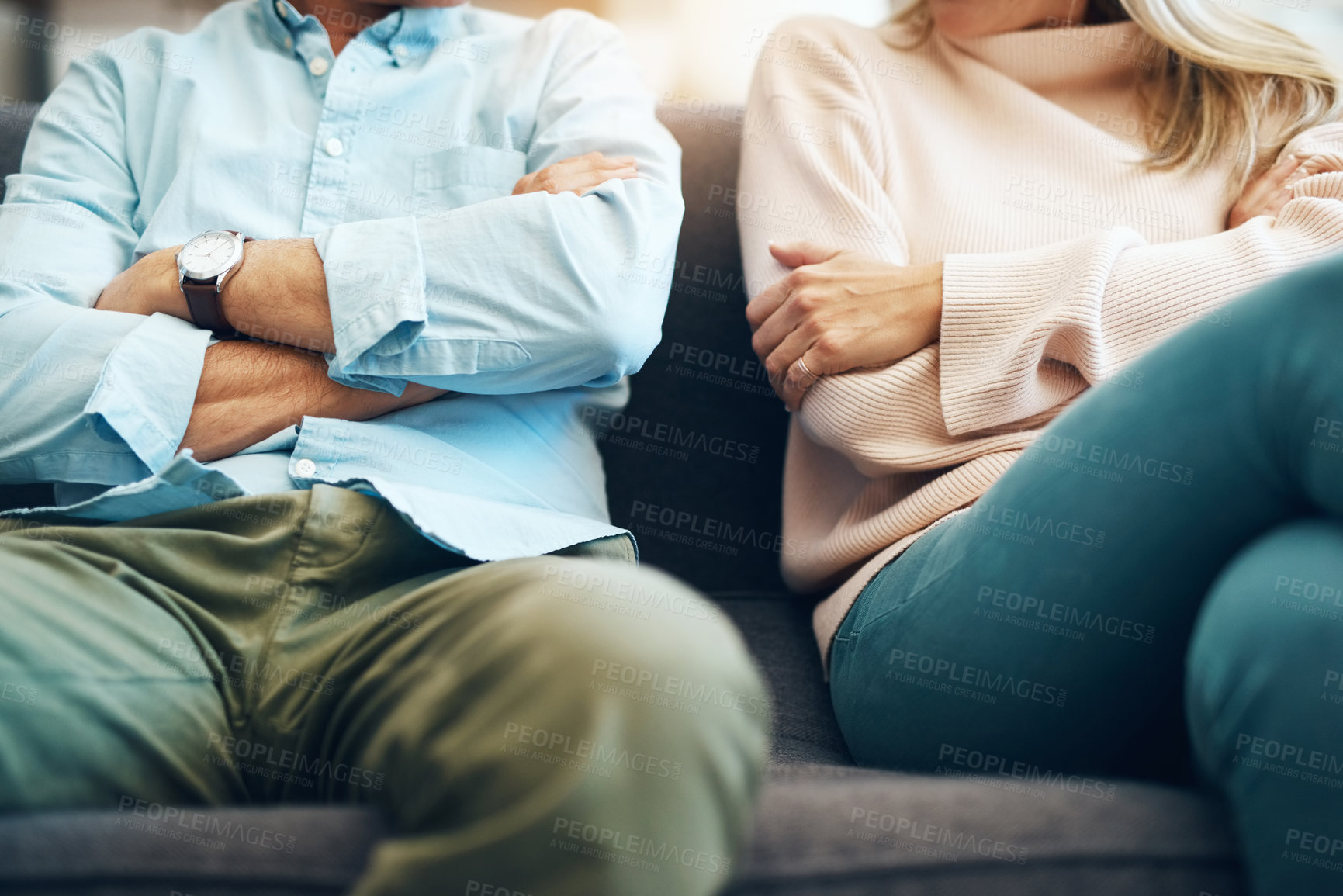 Buy stock photo Divorce, angry and couple fight arms crossed due to family law problem in a marriage with conflict in a home lounge. Anger, living room and partner or people frustrated, depressed and mad on a sofa 