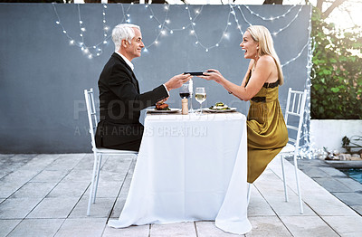 Buy stock photo Shot of a mature couple out on a romantic date