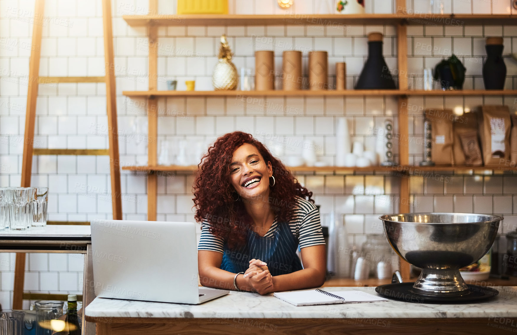 Buy stock photo Cropped portrait of an attractive young woman working in her coffee shop