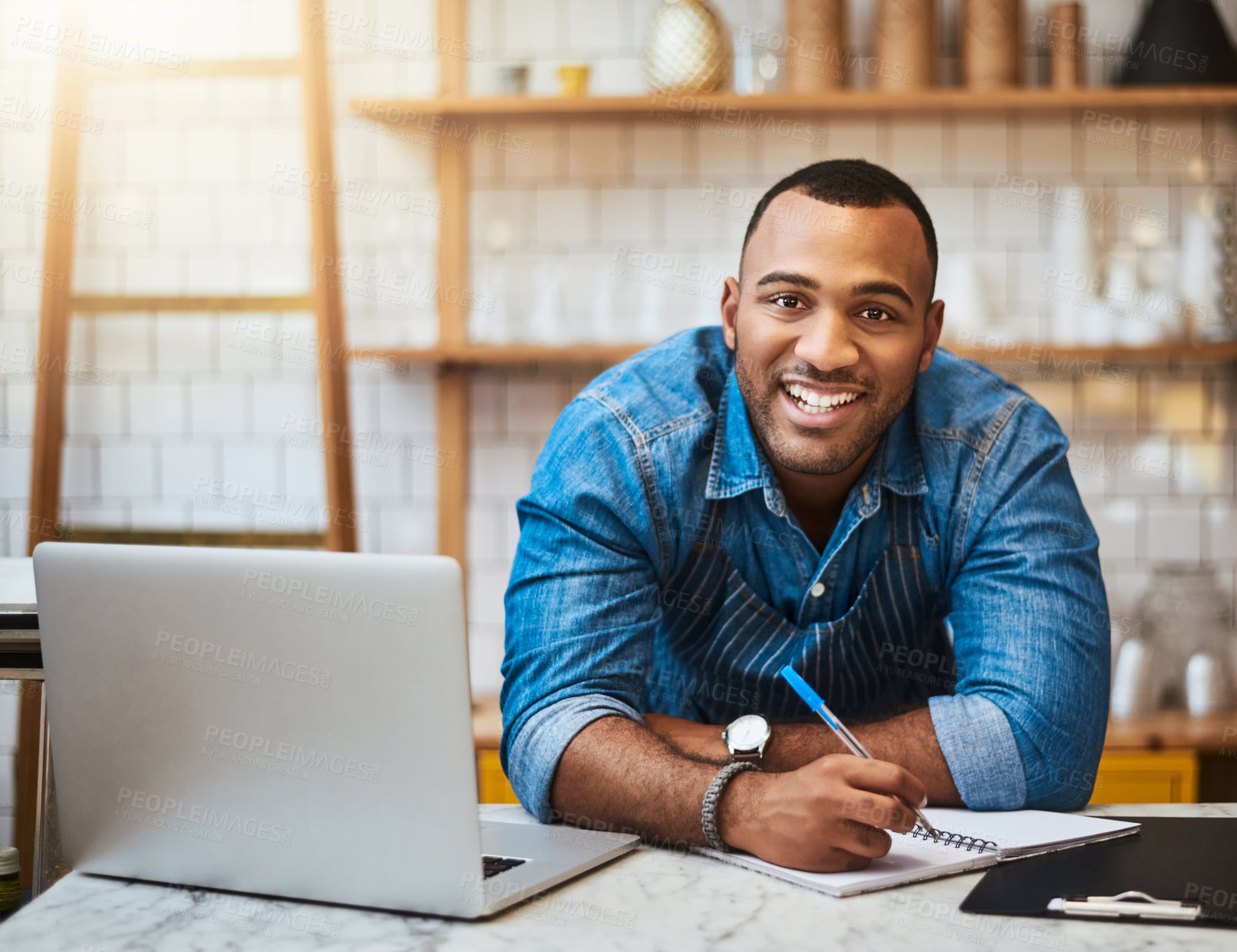 Buy stock photo Cropped portrait of a handsome young man working in his coffee shop