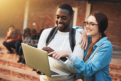 Buy stock photo Interracial couple, students and watching with laptop for social media or online streaming at campus. Happy, man and woman with smile or backpack on computer for research, browsing or app at college