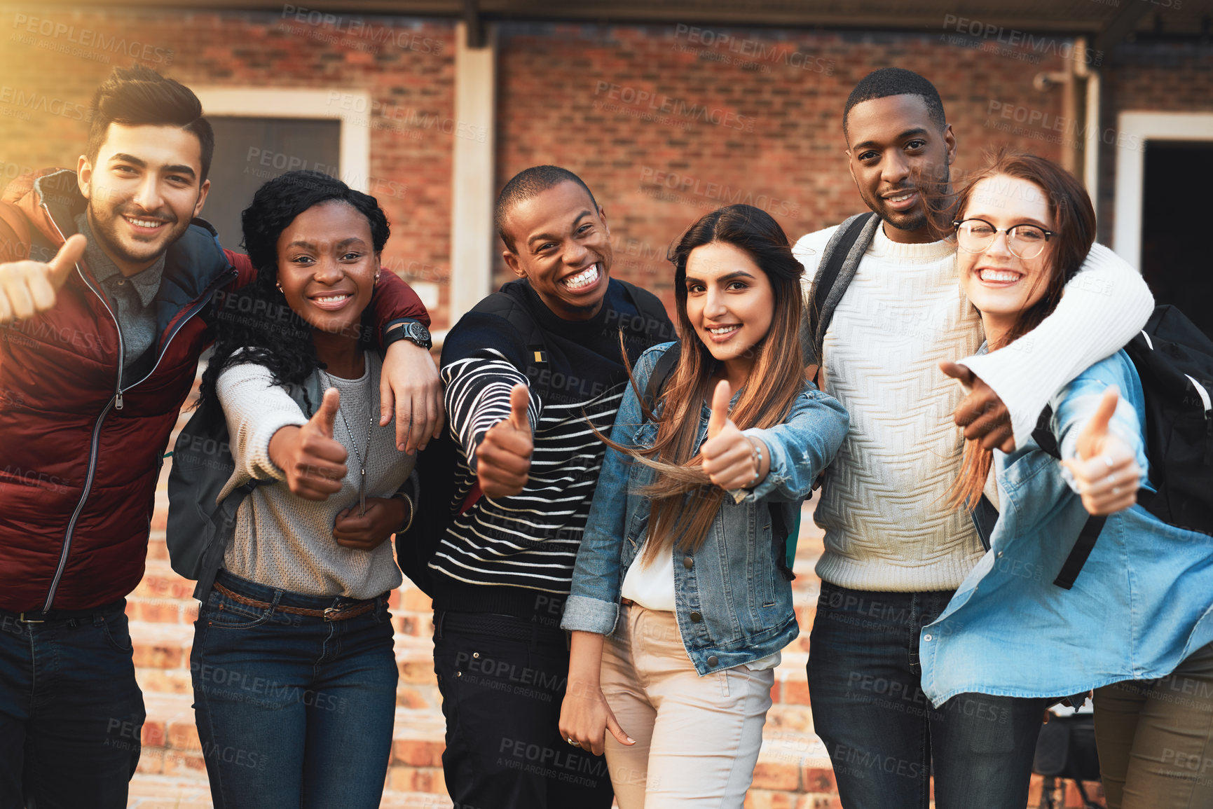 Buy stock photo Happy people, students and portrait with thumbs up at college for feedback, review or vote on campus. Young, group and friends with smile, like emoji or yes sign for university or education together