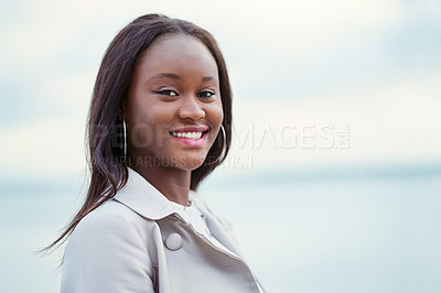 Buy stock photo Smile, gen z and fashion with portrait of black woman in city for youth, culture and Identity. Happiness, edgy and cool with face of person in urban Kenya downtown for vacation, trends and style
