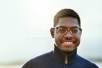 Buy stock photo Portrait of a handsome young man spending time outdoors