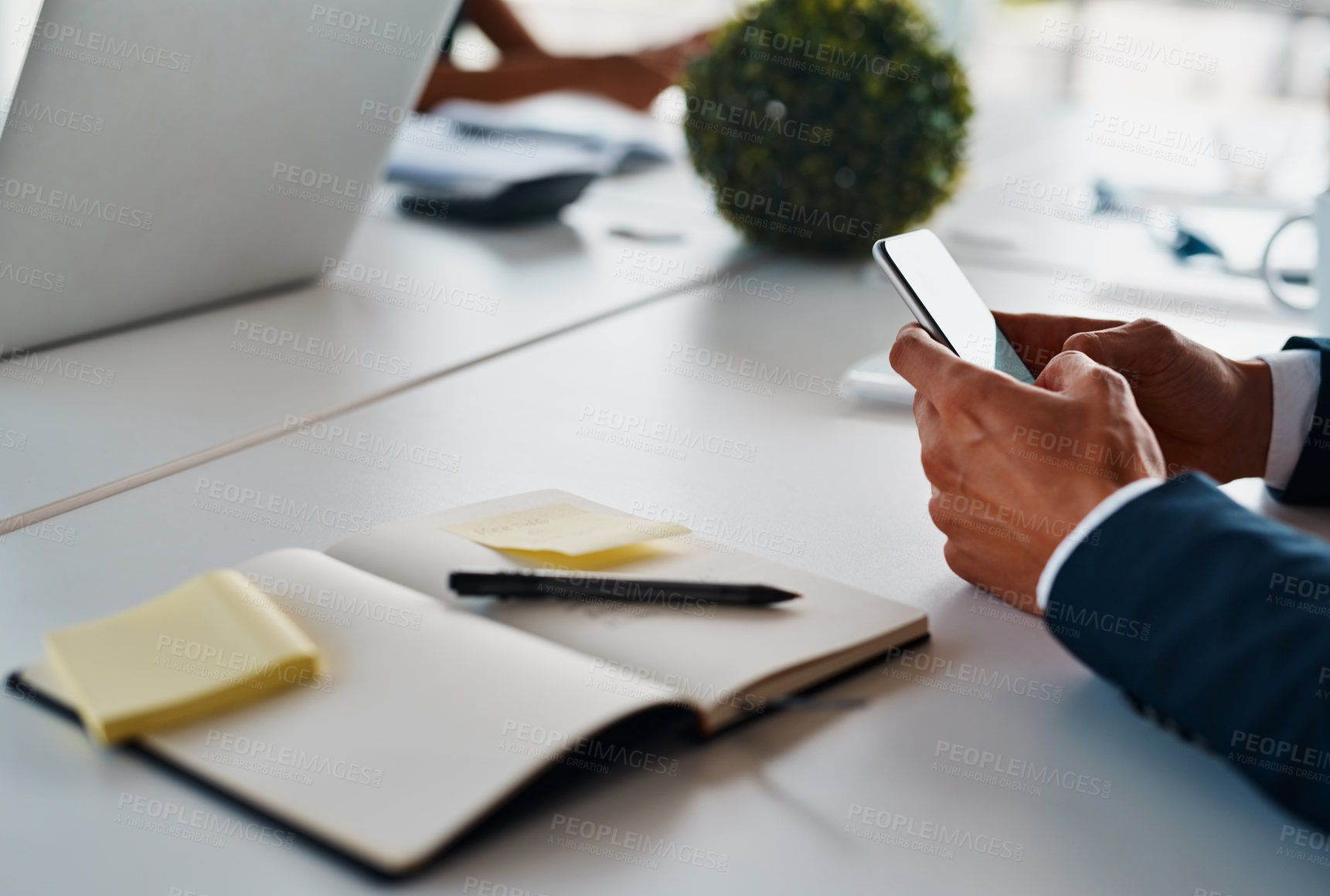 Buy stock photo Businessman, phone and hands in office with notebook, schedule and making appointment at desk. Person, mobile and journal at table for contact, communication and calendar app for planning and typing