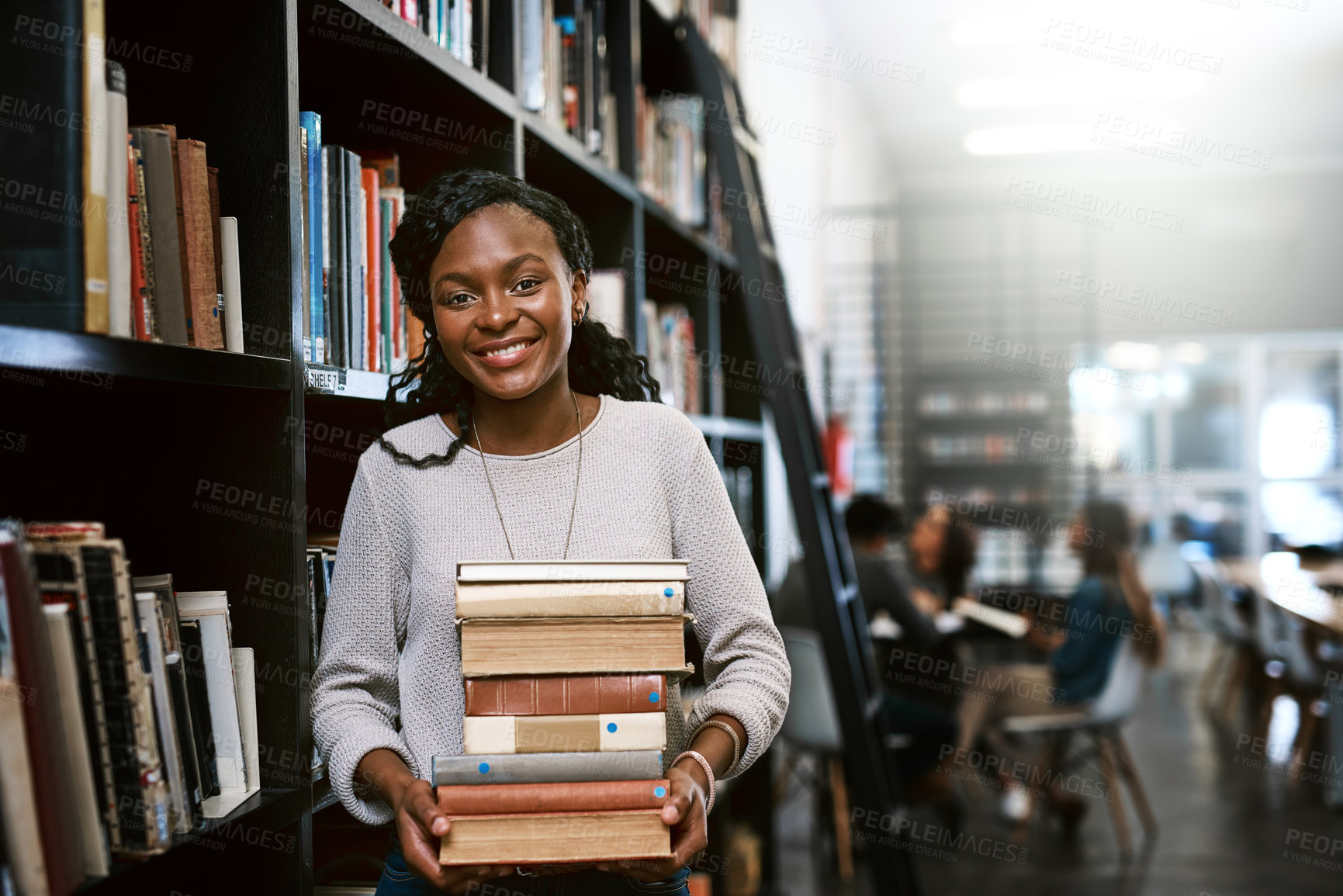 Buy stock photo Portrait, education and black woman with books, library and university with a smile, bookshelf and studying. Face, female person or happy student with research, literature and learning with knowledge