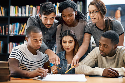 Buy stock photo People, students in library and studying for exam or research for project, education and teamwork. Diversity, young men and women in study group and learning with collaboration on university campus