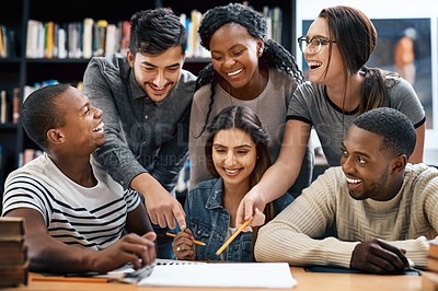 Buy stock photo Students laughing in library, studying together for exam or research for project, education and teamwork. Diversity, funny and young men with women in study group, learn together and happy on campus