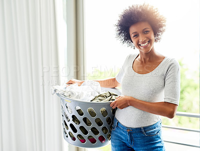 Buy stock photo Laundry, woman and portrait in house with basket and happy from morning routine and spring cleaning. Maid, service and cleaner with clothing, care and washing in a lounge with confidence from job  