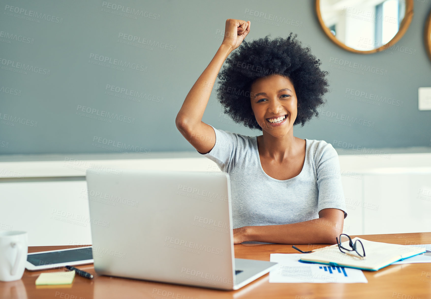 Buy stock photo Cropped portrait of an attractive young businesswoman cheering while working at home