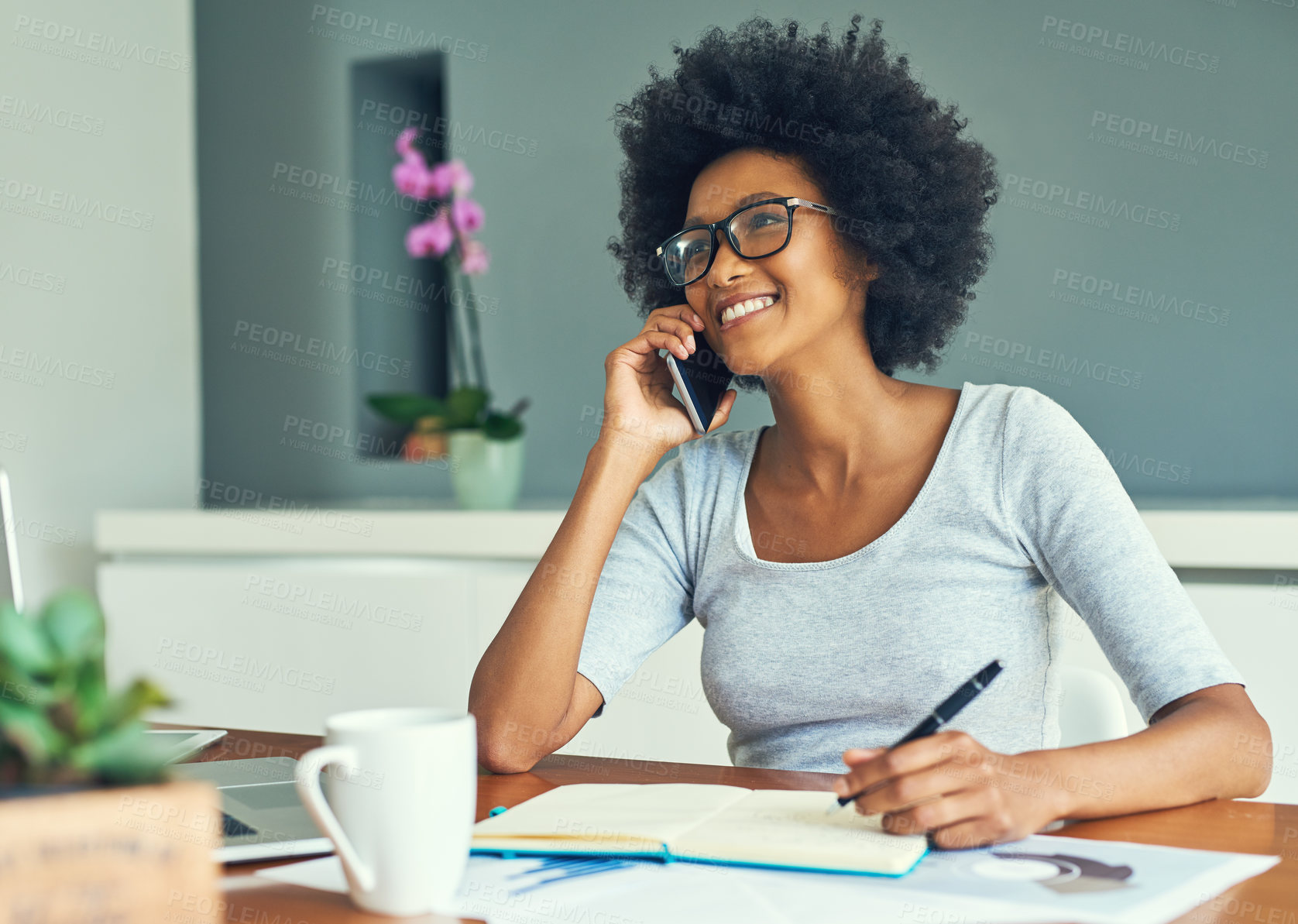 Buy stock photo Cropped shot of an attractive young businesswoman working at home