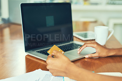 Buy stock photo Cropped shot of an unrecognizable businesswoman doing her banking online at home