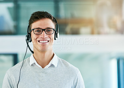 Buy stock photo Portrait of a young call center agent working in an office