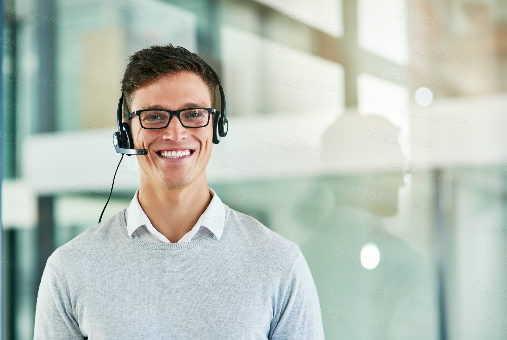 Buy stock photo Portrait of a young call center agent working in an office