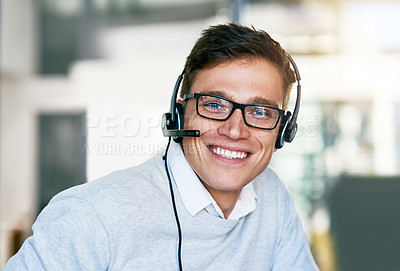 Buy stock photo Portrait of a young call center agent working in an office