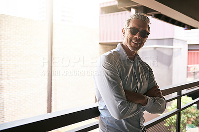 Buy stock photo Portrait of a mature businessman standing outside