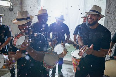Buy stock photo Shot of a group of musical performers playing together indoors