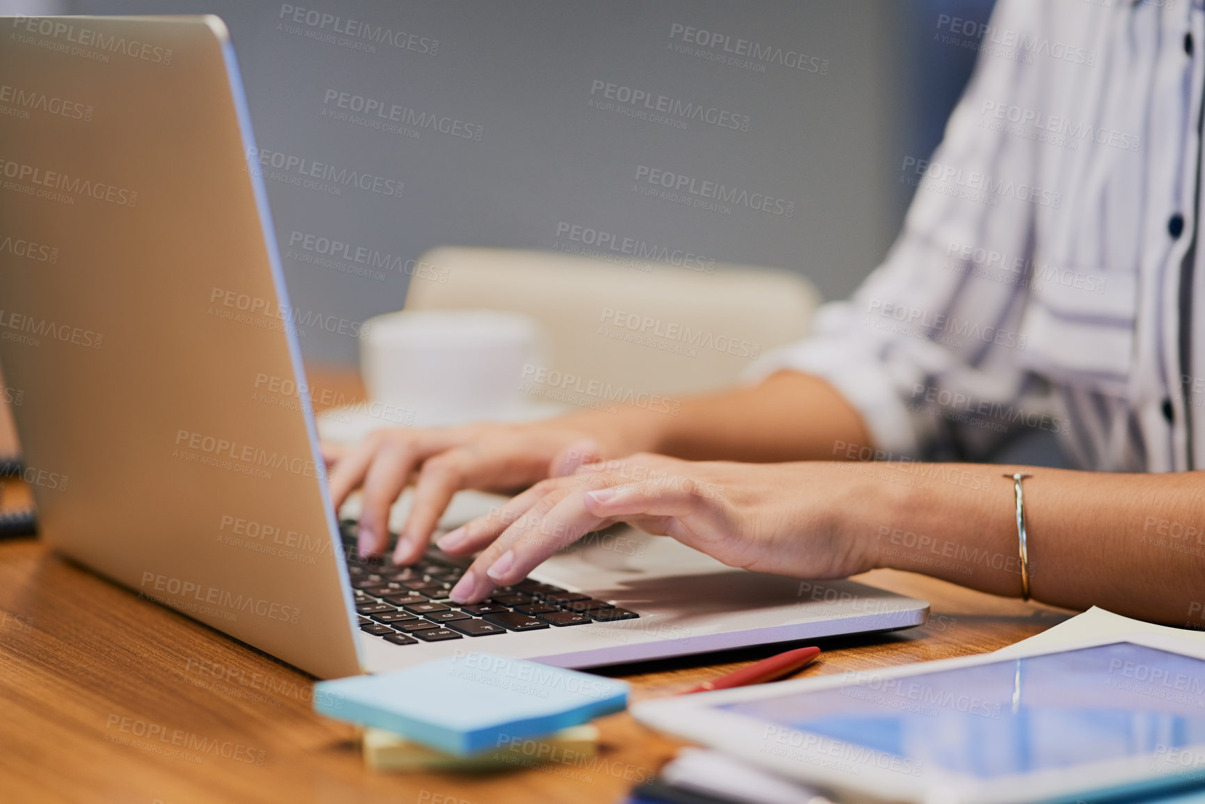 Buy stock photo Hands, business person and typing on computer for research, editing email or networking. Laptop, worker and writing on keyboard closeup for publication results or check manuscript in creative startup