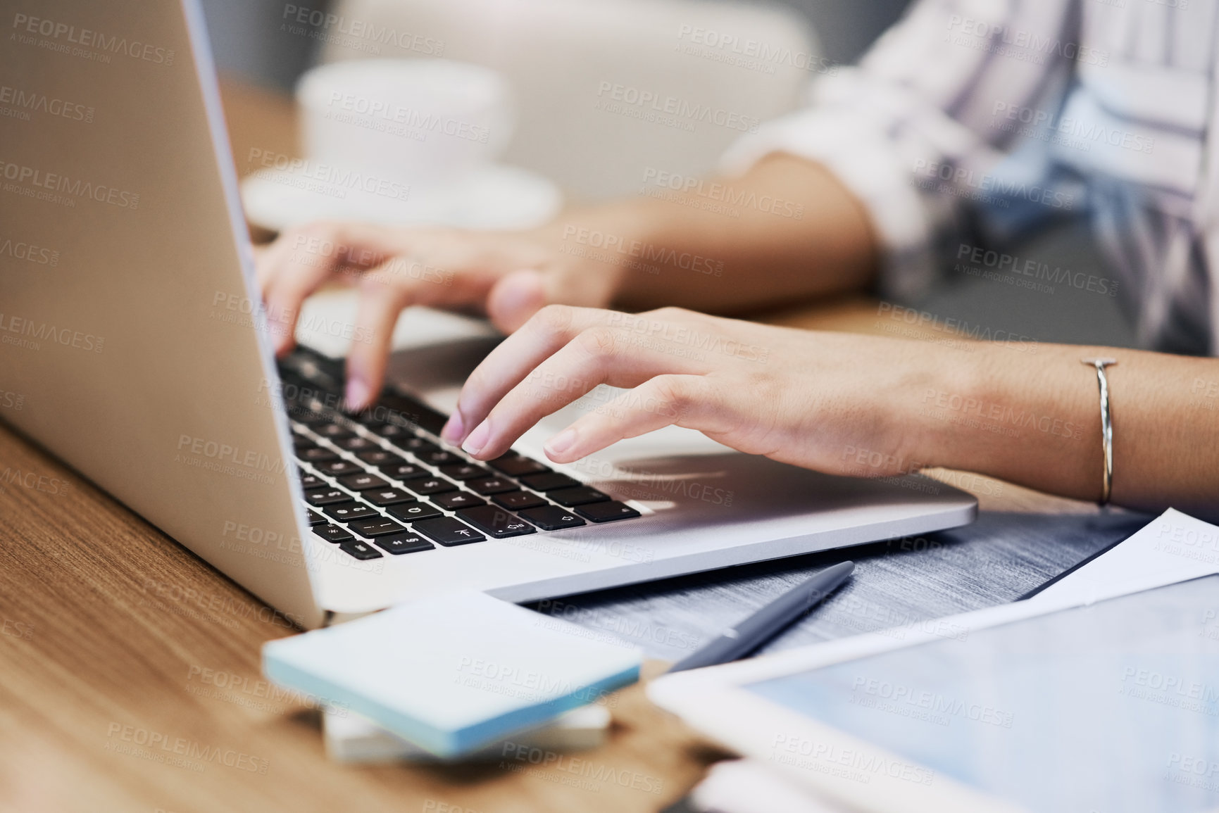 Buy stock photo Hands, business person and typing on laptop for research, editing email or networking. Computer, worker and writing on keyboard closeup for publication results or check manuscript in creative startup