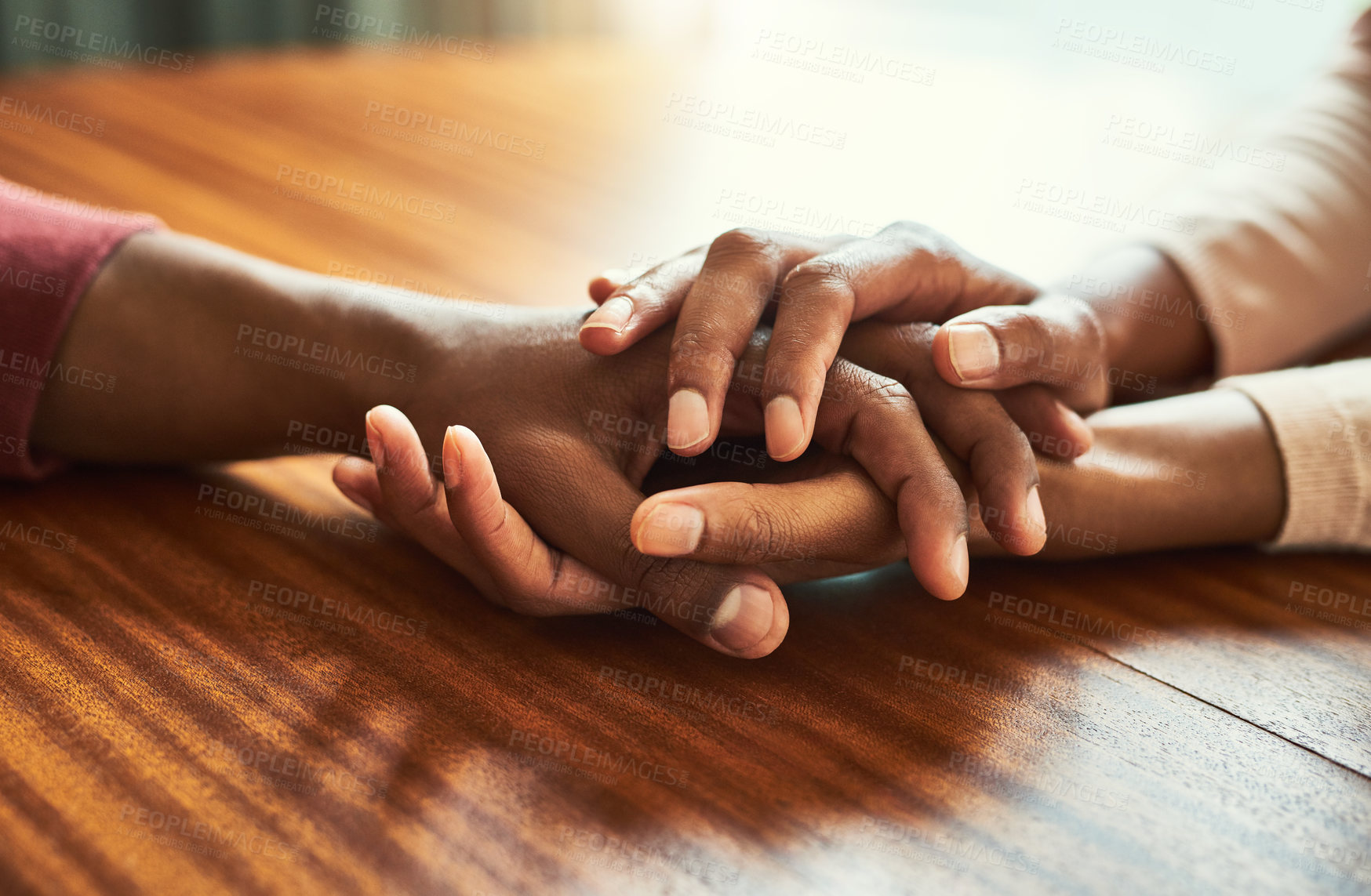 Buy stock photo Closeup shot of two unrecognizable people holding hands in comfort