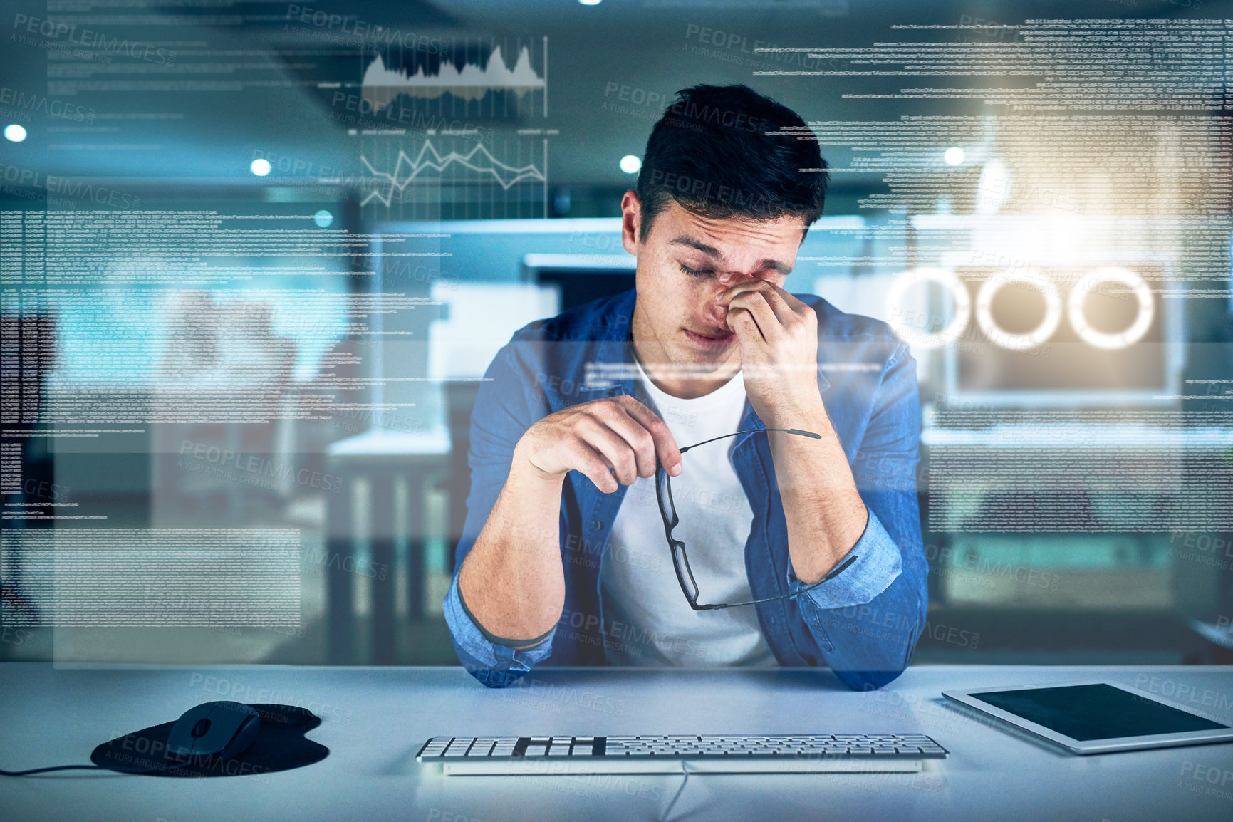 Buy stock photo Tired, programmer and man in office, night and overlay of interface, keyboard and headache. Dark, dashboard and coder for agency, information technology and exhausted of thinking, ideas and burnout