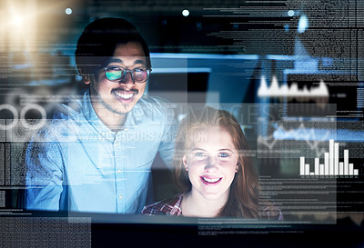 Buy stock photo Portrait of two focussed young programmers working together on a computer in the office at work during the night