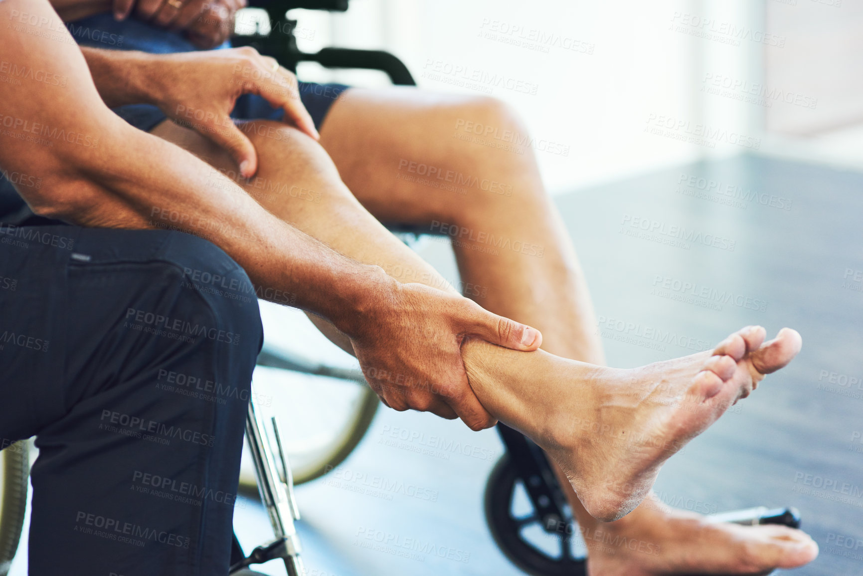 Buy stock photo Cropped shot of an unrecognizable male physiotherapist assisting a senior patient in recovery