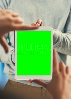 Buy stock photo Cropped shot of two unrecognizable businessmen framing a digital tablet with a green screen