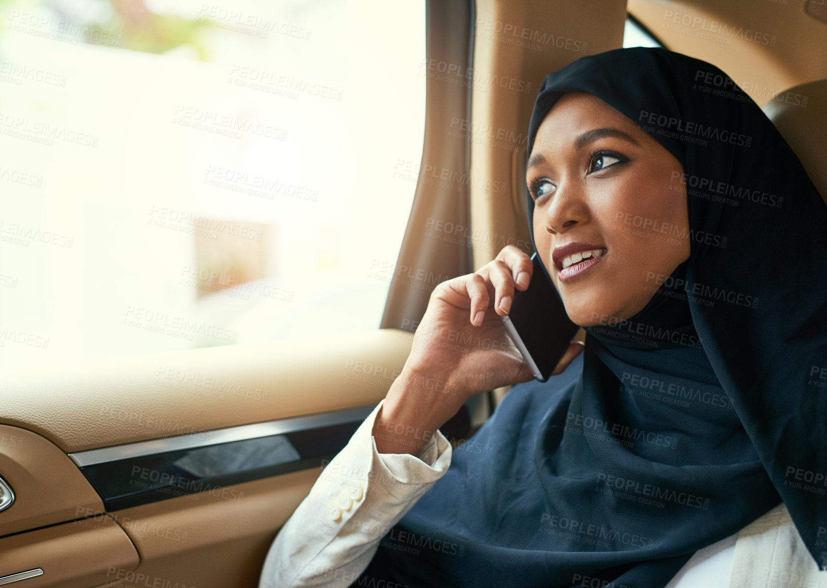 Buy stock photo Passenger, talking or Muslim woman in taxi for travel, phone call or discussion in car backseat. Service, transportation or Islamic girl thinking of address in mobile conversation in vehicle on road