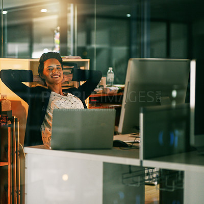 Buy stock photo Portrait of a young businesswoman taking a break while working late in an office