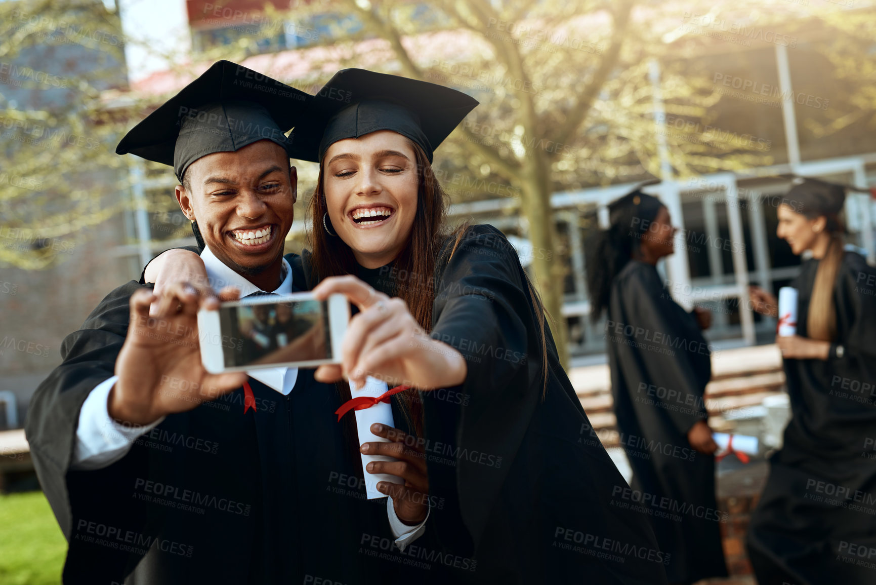 Buy stock photo Excited people, students and graduation with selfie for picture, memory or photography at university. Happy friends or young graduates with smile or moment on certificate, degree or diploma at campus