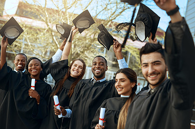 Buy stock photo Celebration, university and hats for group of graduates together with joy, graduation day and academic achievement outdoors. Education, young and students diversity in success and happy outside 
