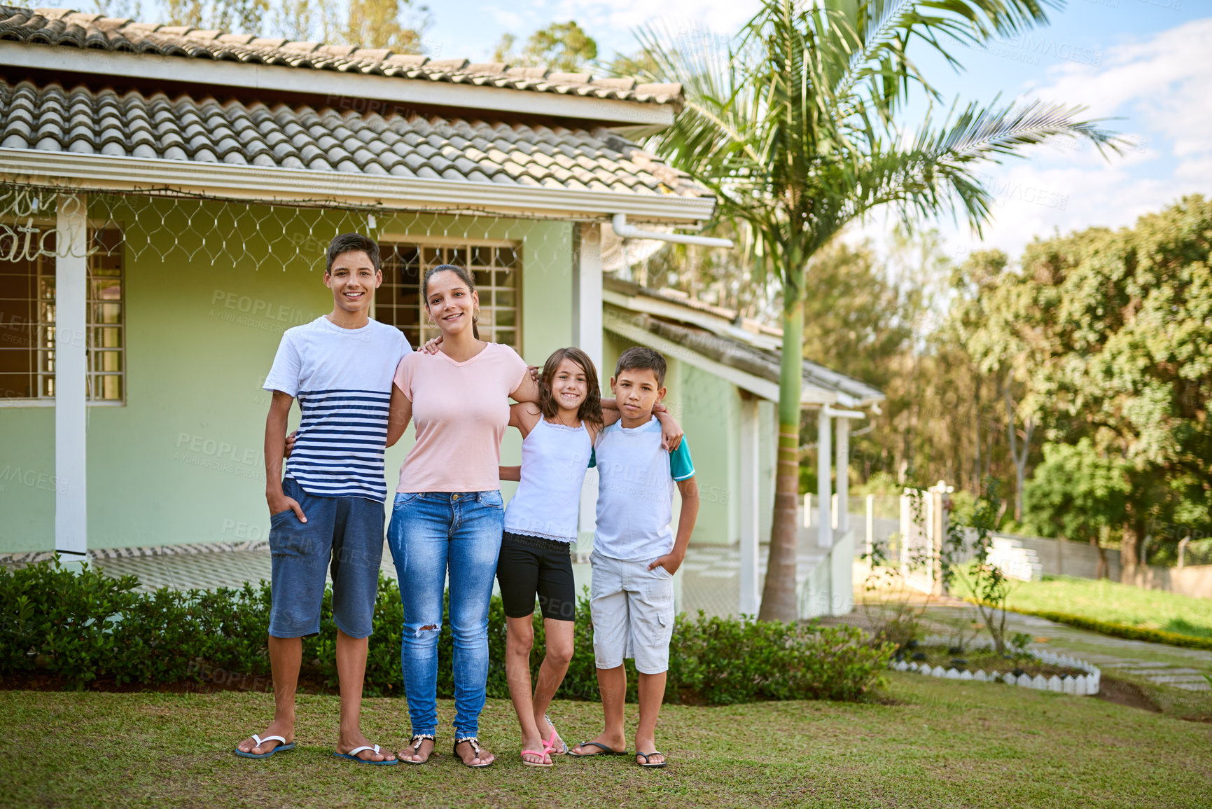 Buy stock photo Mother, children and hug in backyard for portrait, support and relationship development at new home. Kids, mom and people in garden for weekend, sibling bonding and happiness with parent in Colombia