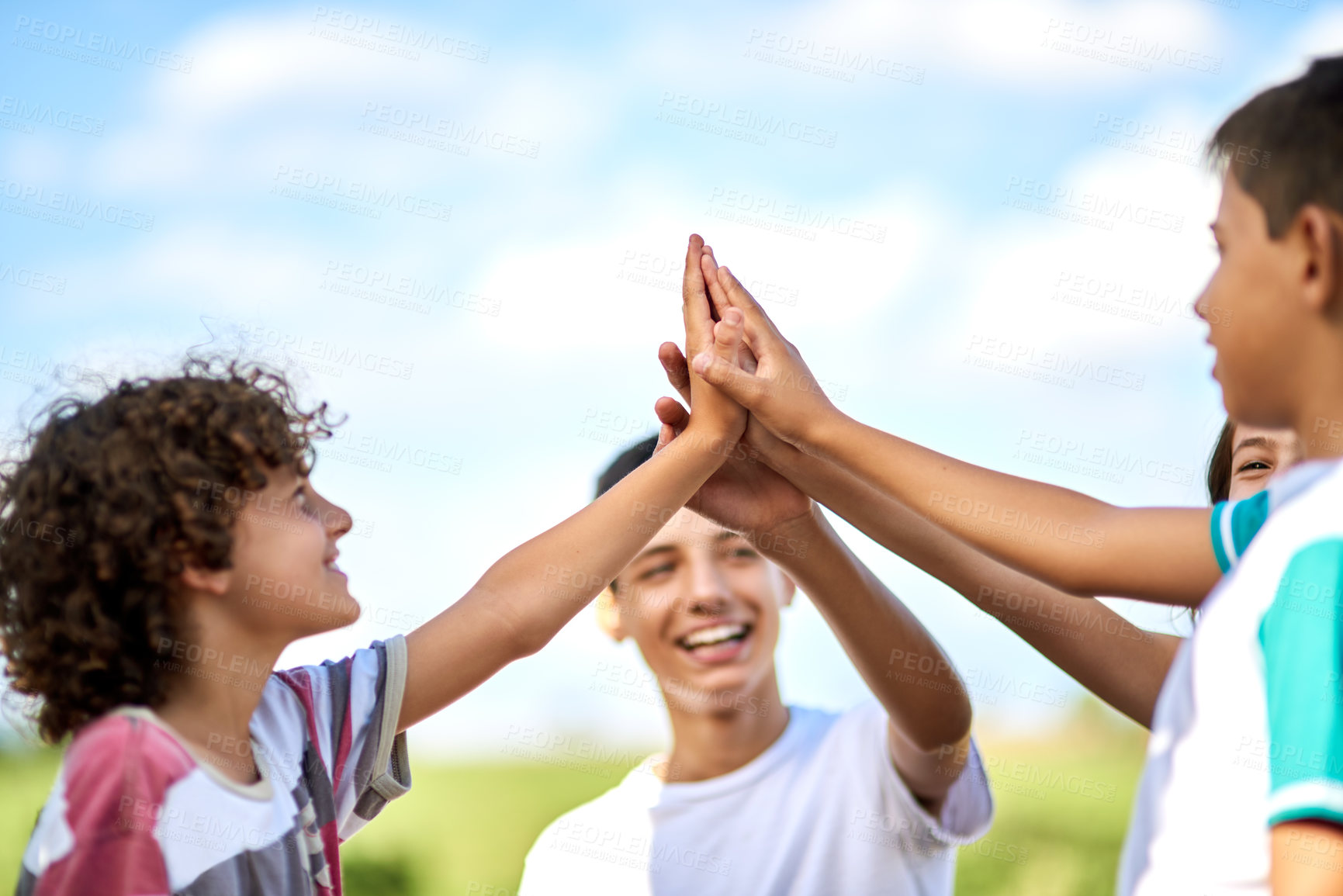 Buy stock photo Family, children and high five in nature for support, relationship development and excited. Siblings, happy and hand gesture on field for friendly game, kids bonding and weekend fun in Colombia