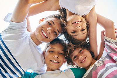 Buy stock photo Face, children and family circle or a group of happy siblings together or huddled in solidarity and smiling outdoors. Hug, brothers and sisters or excited kids play or bonding and united outside