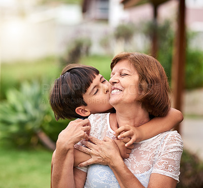 Buy stock photo Cropped shot of an adorable little boy spending quality time with his grandmother