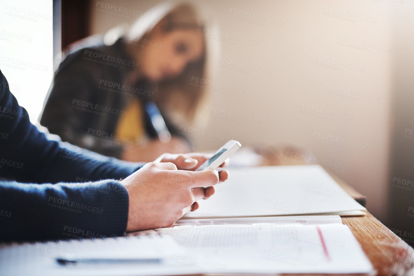 Buy stock photo Cropped shot of unrecognizable university students in class