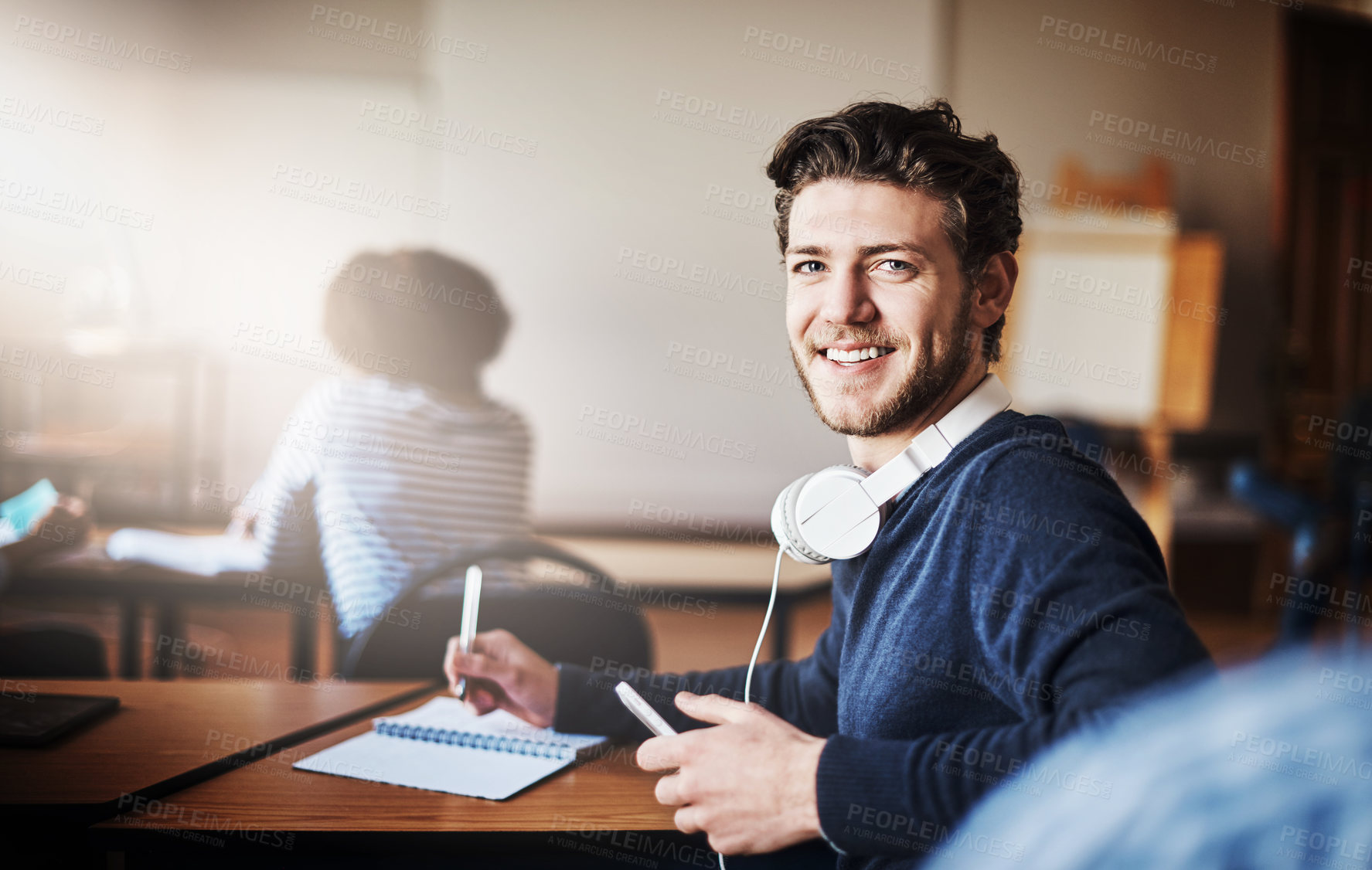 Buy stock photo Cropped shot of university students in class