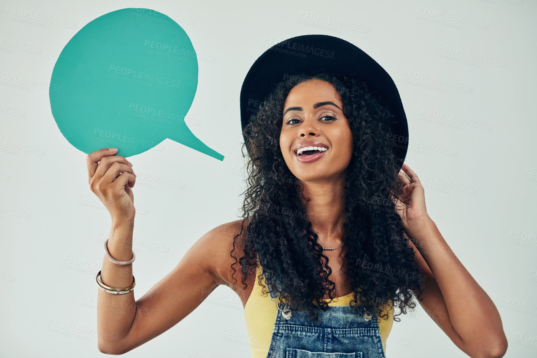 Buy stock photo Happy girl, portrait and fashion with speech bubble for social media, trend or notification on a studio background. Young female person with smile, shape or quote for stylish clothing on mockup space