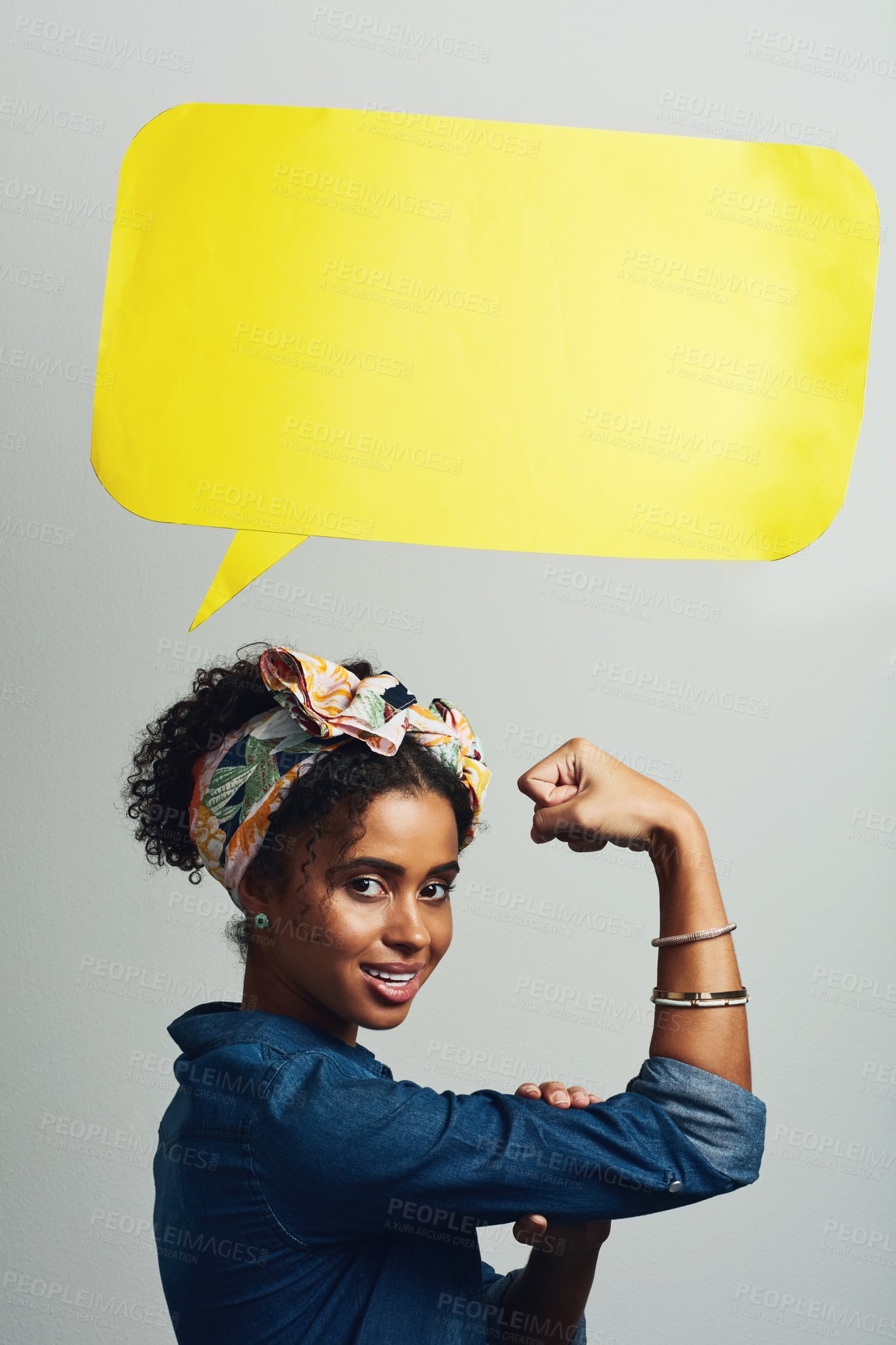 Buy stock photo Studio shot of an attractive young woman posing with a speech bubble against a grey background