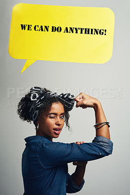 Buy stock photo Studio shot of an attractive young woman posing with a speech bubble that reads 