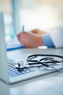 Buy stock photo Computer, stethoscope and doctor hands writing on clipboard, healthcare information and research for insurance. Paperwork, documents and checklist of medical professional at desk on laptop and notes