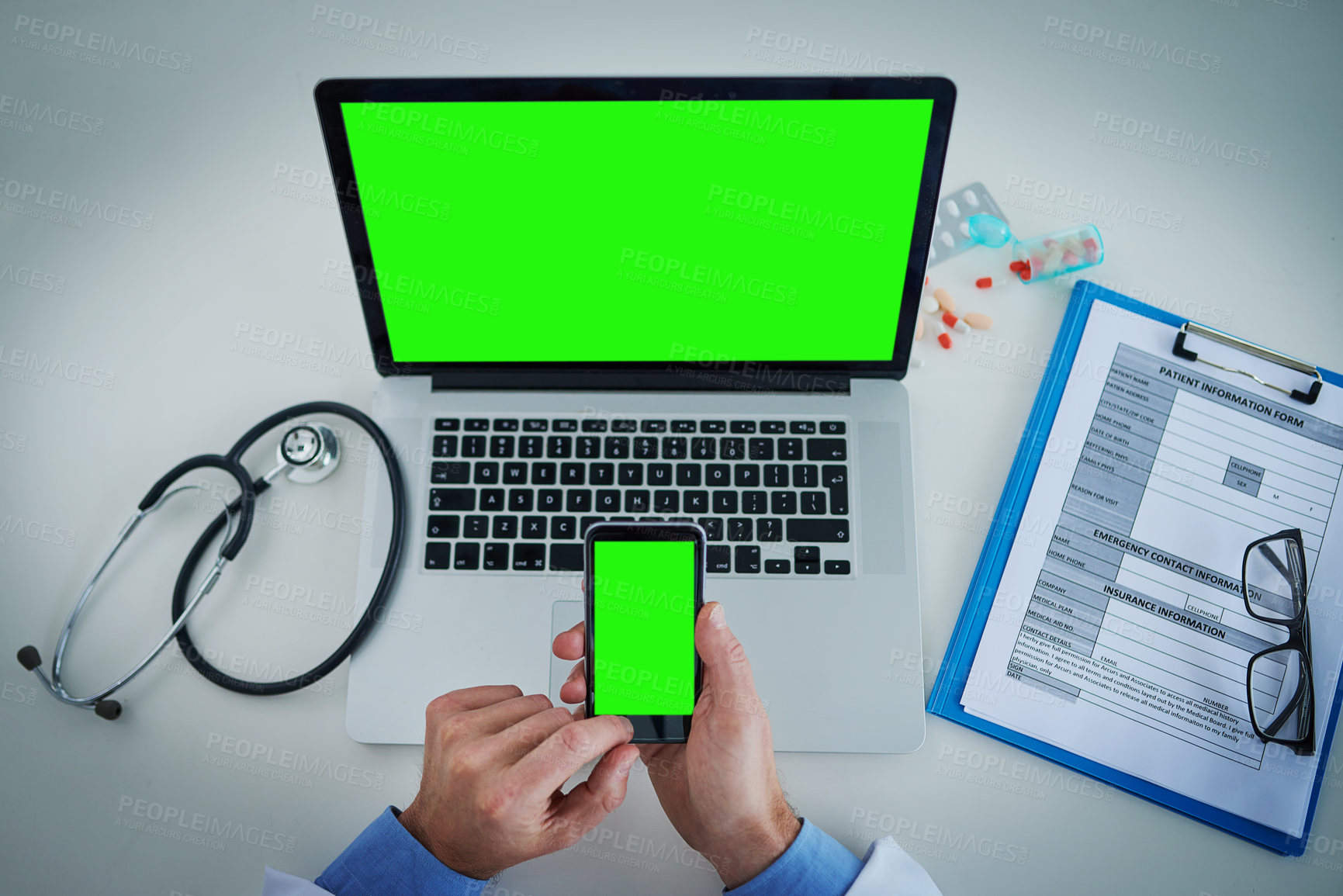 Buy stock photo Phone, green screen and doctor on laptop for healthcare service, online planning and research with hands above. Space, telehealth and pills of medical person typing on mobile app, mockup and computer
